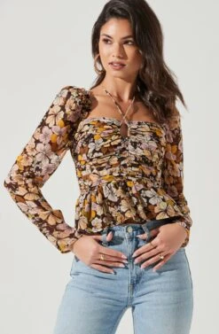 Toni Ruched Halter Long Sleeve Peplum Top 30 Toni Ruched Halter Long Sleeve Peplum Top -Astr The Label Shop ACT17339 BROWN YELLOWFLORAL 0154